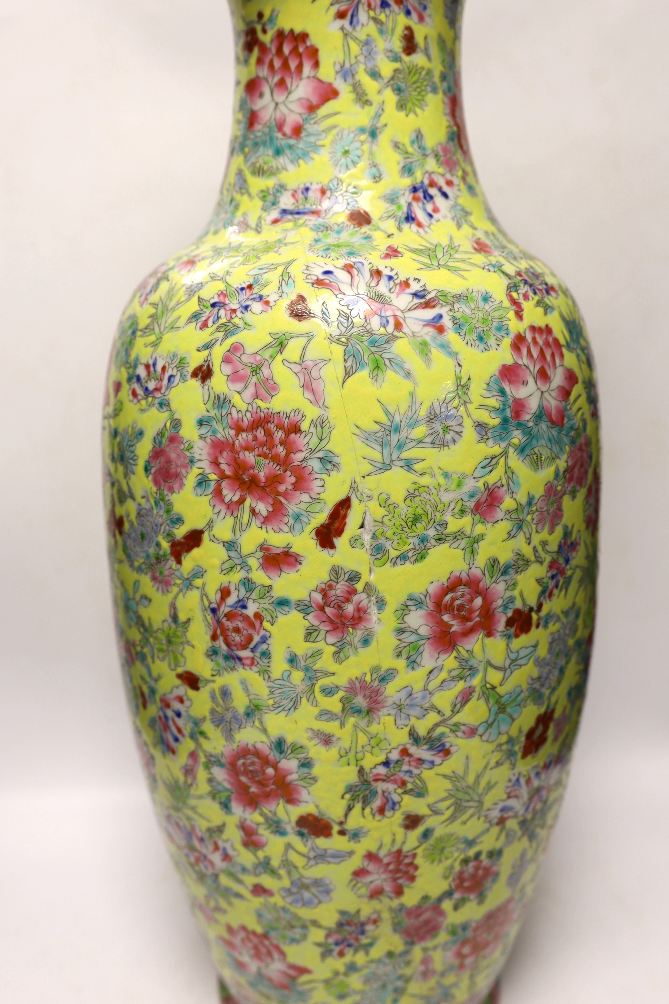 A large Chinese famille rose yellow ground baluster vase, 62cm high